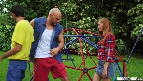 Bully fucks petite redhead in a park